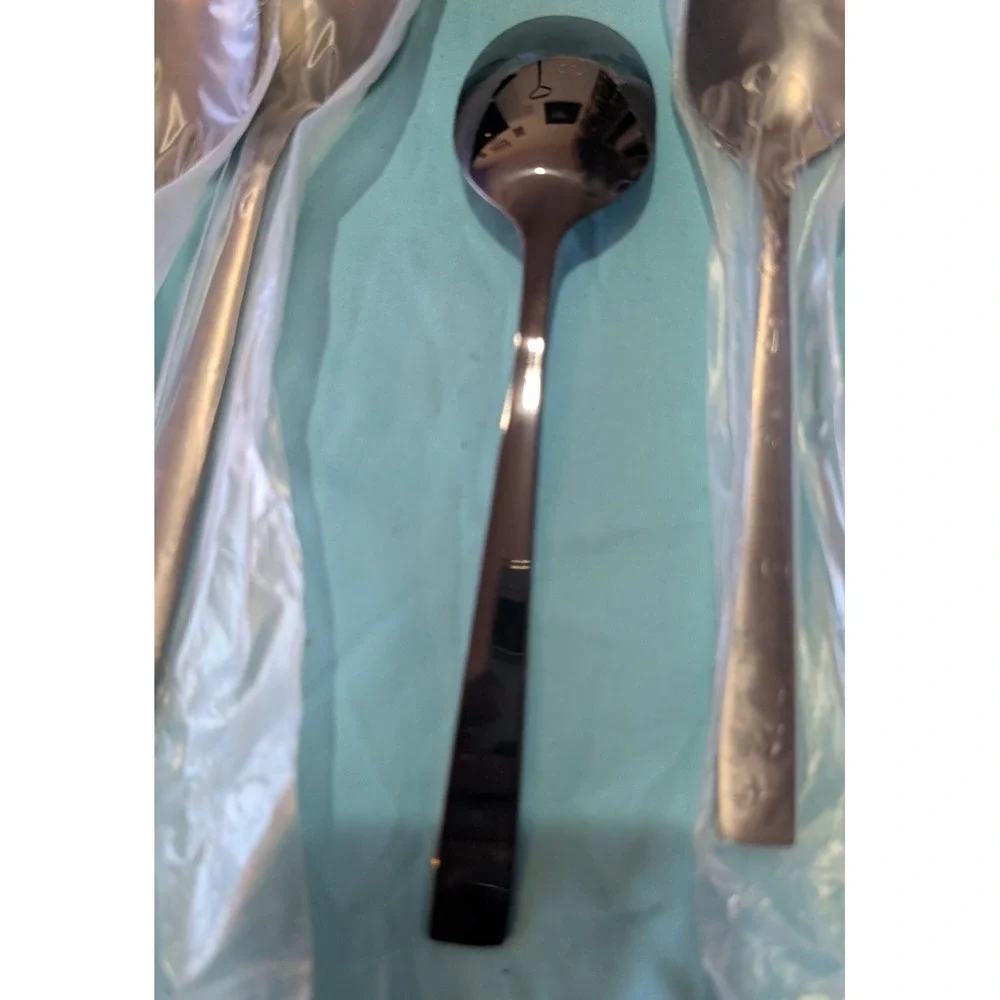 8‎ larger Black Spoons 7